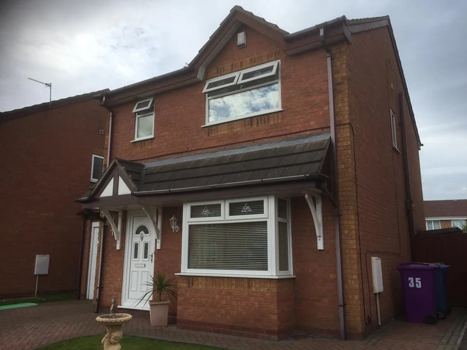 Liverpool detached property showing existing roof and guttering before replacement by Sefton Roofing